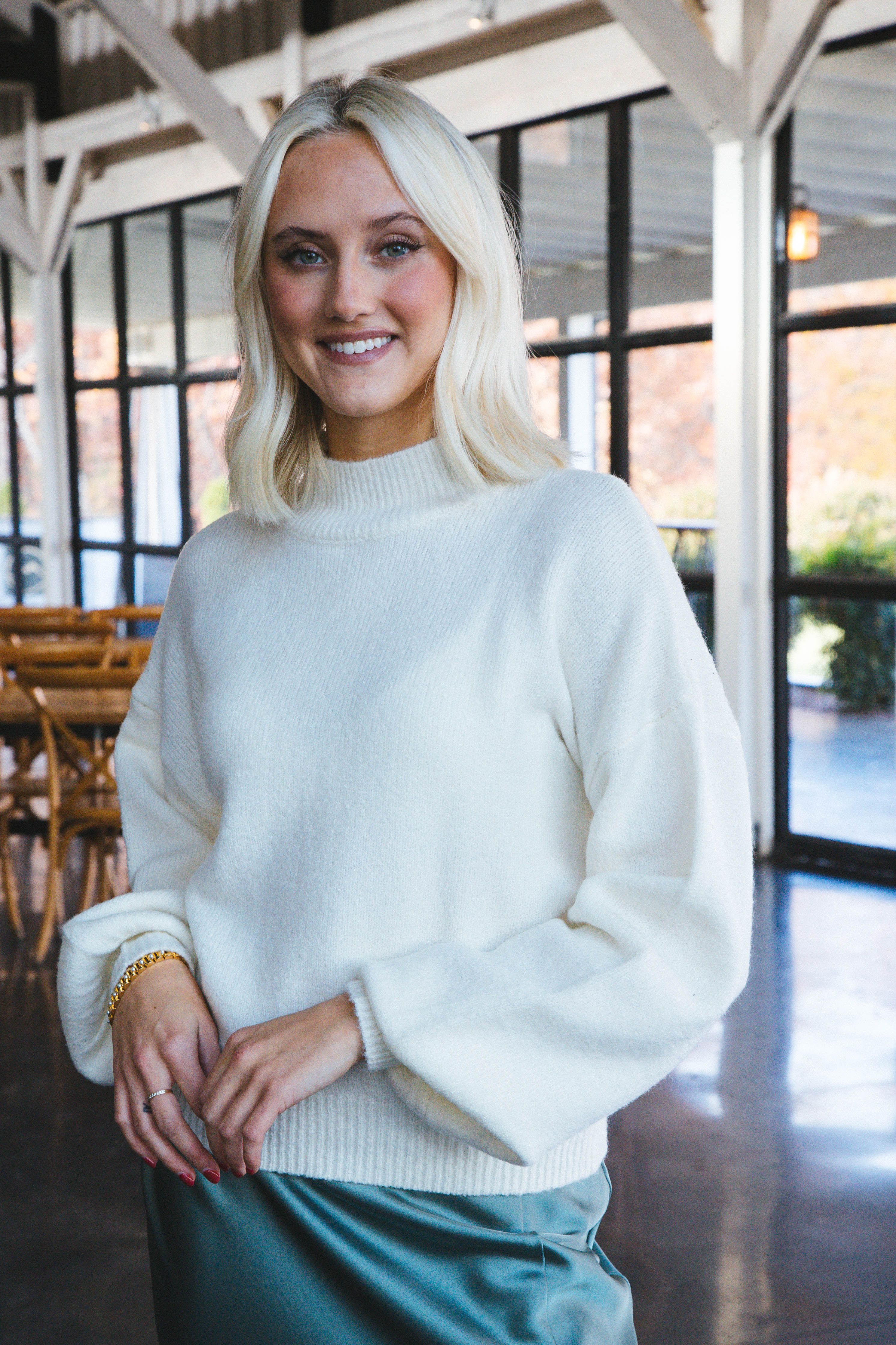 Avery Balloon Sleeve Mock Neck Solid Sweater, Cream sold by North & Main Clothing Company