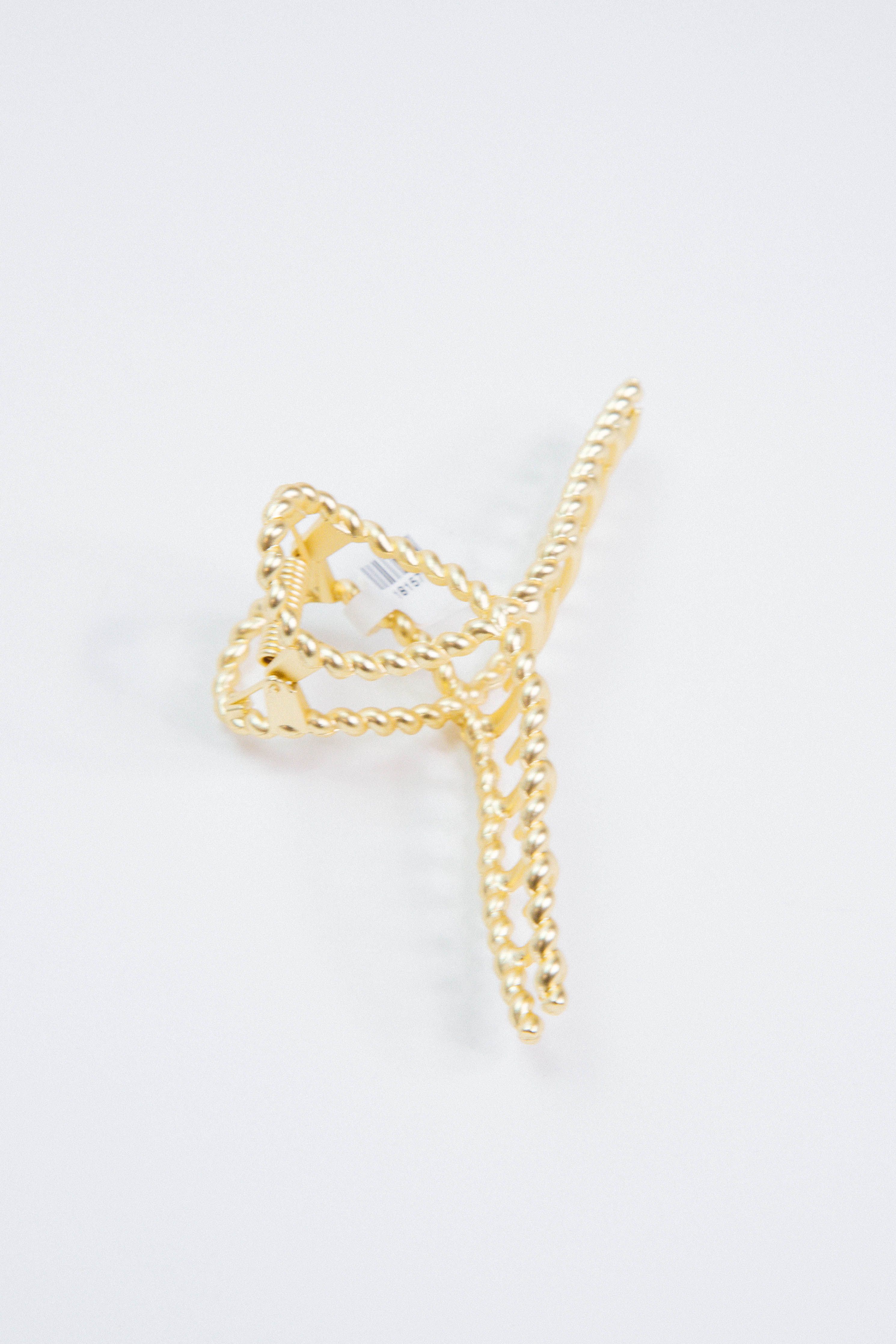 Traci Twisted Hair Claw, Matte Gold sold by North & Main Clothing Company product image thumbnail 2