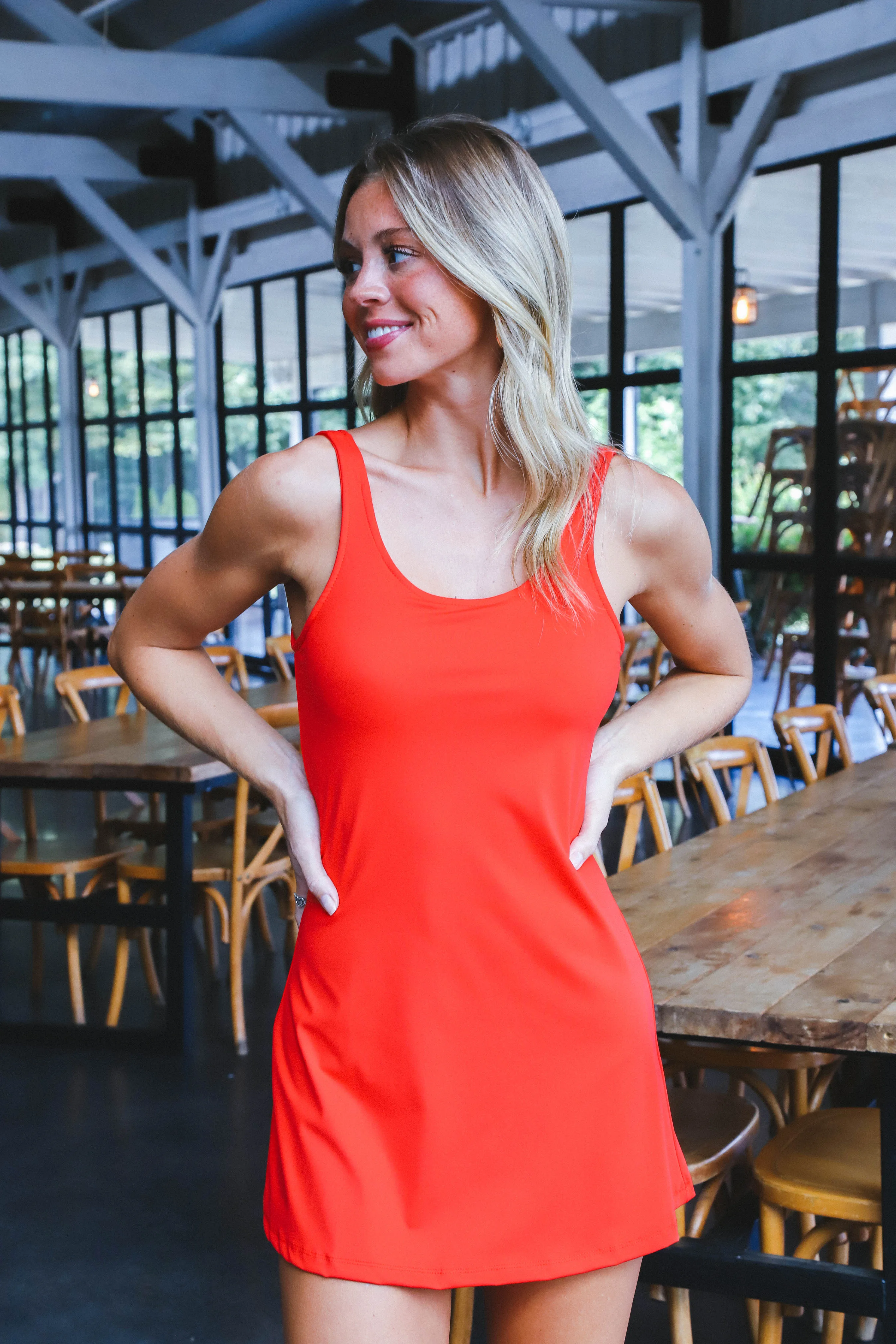 Alia Flare Active Romper Dress, Red sold by North & Main Clothing Company