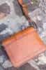 Zoey Medium Flap Crossbody Purse, Medium Brown | Fossil sold by North & Main Clothing Company