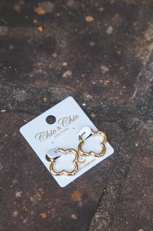 Eva Brass Clover Huggie Hoops made by North & Main Clothing Company
