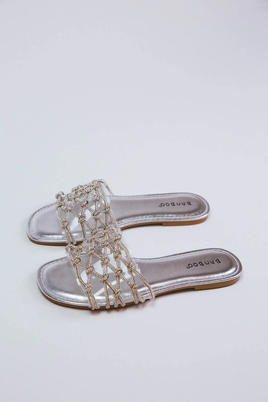 Laughter Stone Slide Sandal, Silver Metallic sold by North & Main Clothing Company