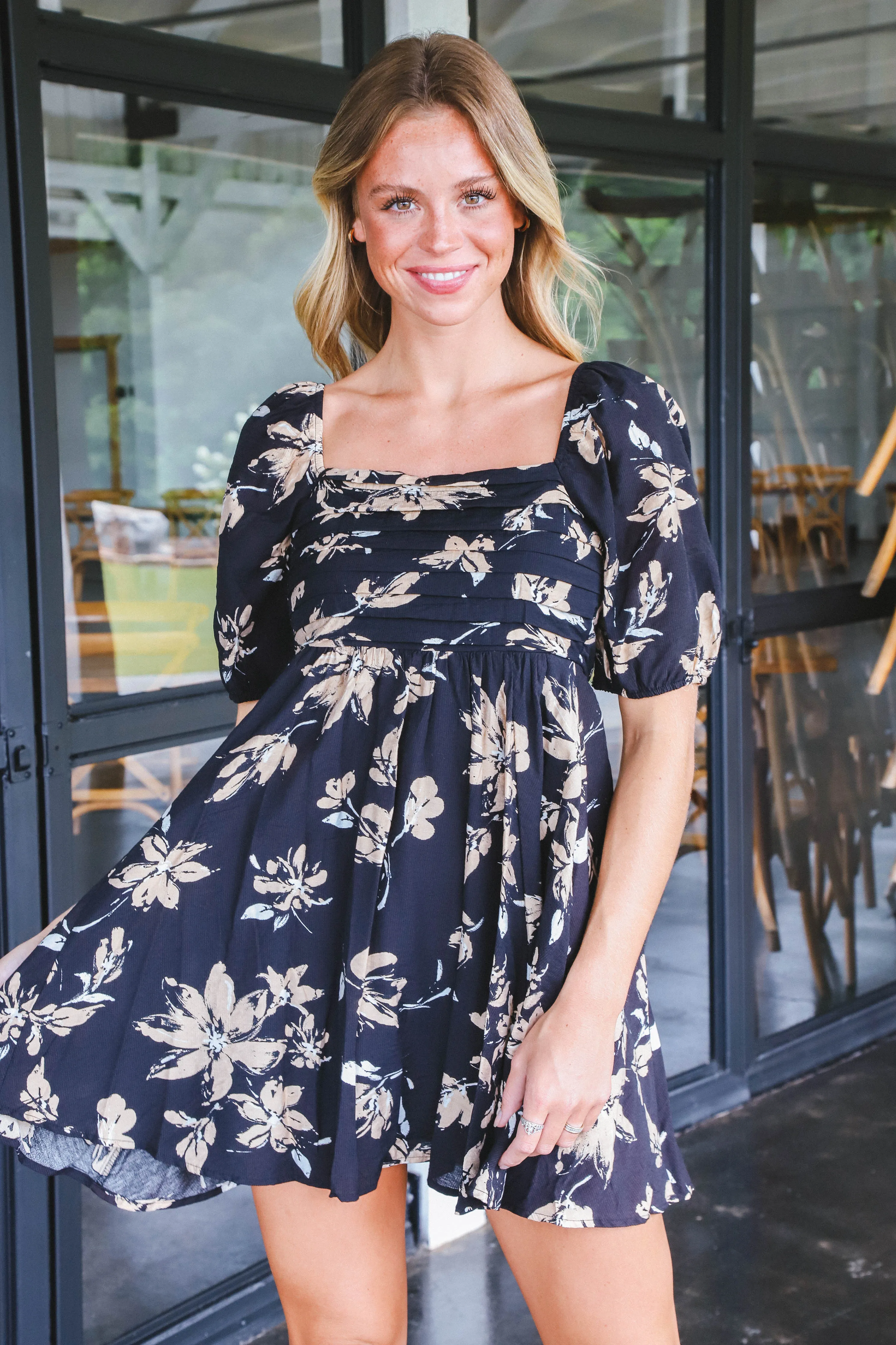 Alma Floral Pleated Mini Dress, Black sold by North & Main Clothing Company product image thumbnail 5