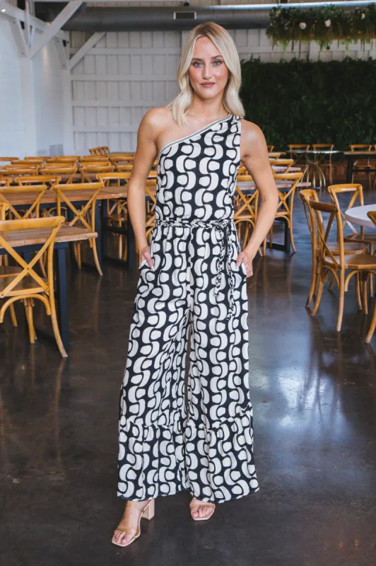 Sabrina One Shoulder Jumpsuit, Black sold by North & Main Clothing Company