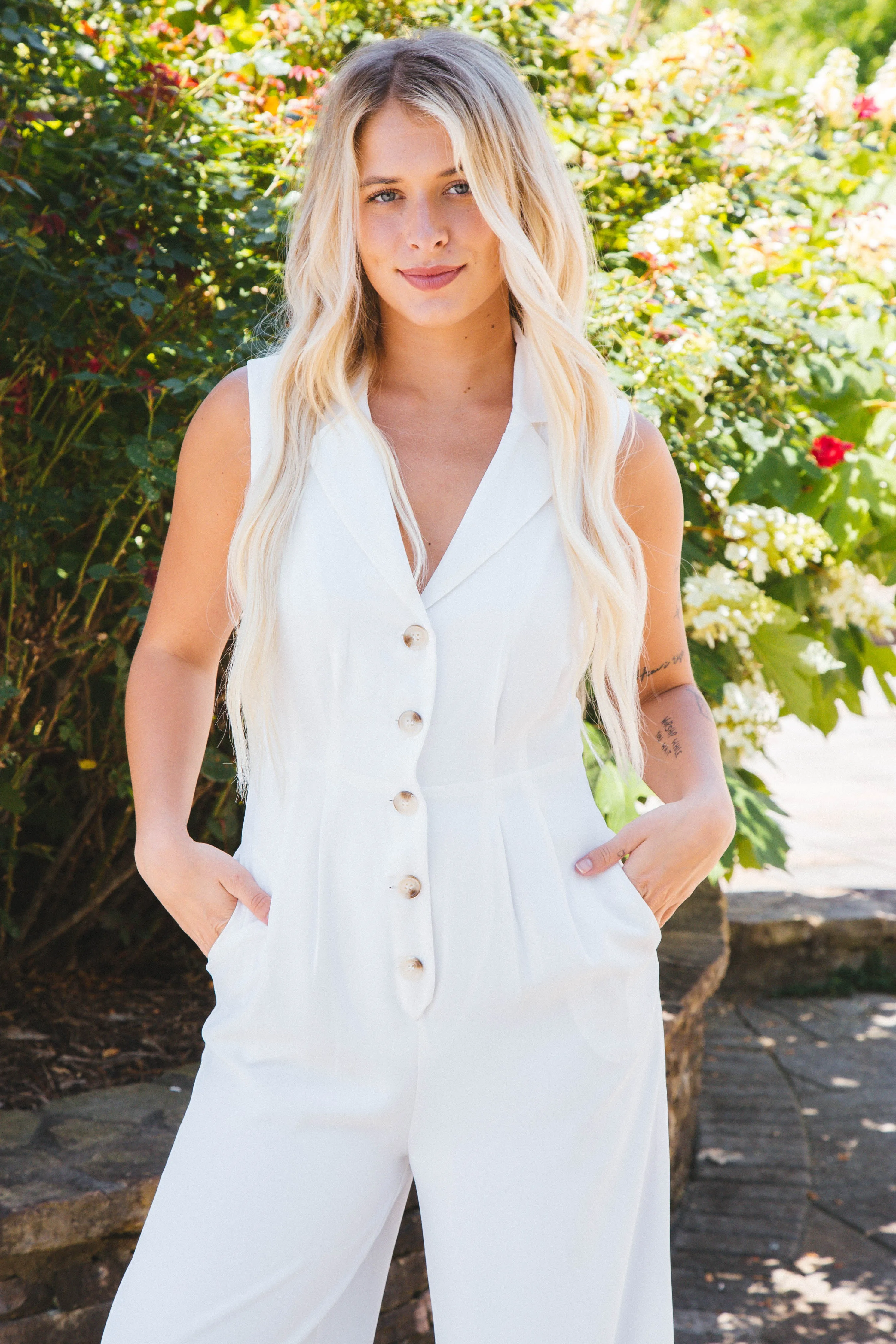 The Classics Button Front Jumpsuit, White | Sadie & Sage sold by North & Main Clothing Company product image thumbnail 2