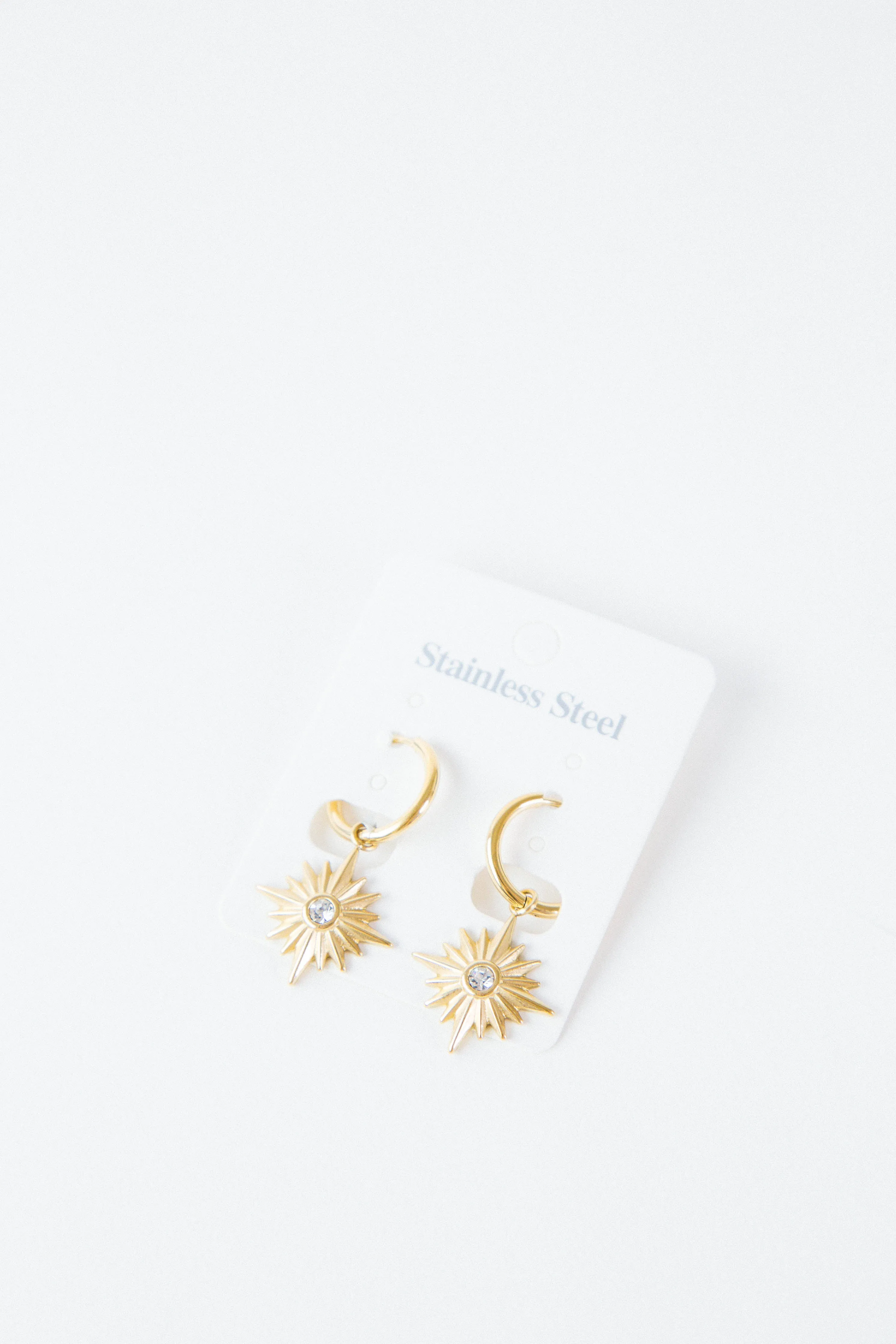 Star Pendant Huggie Earring, Gold sold by North & Main Clothing Company