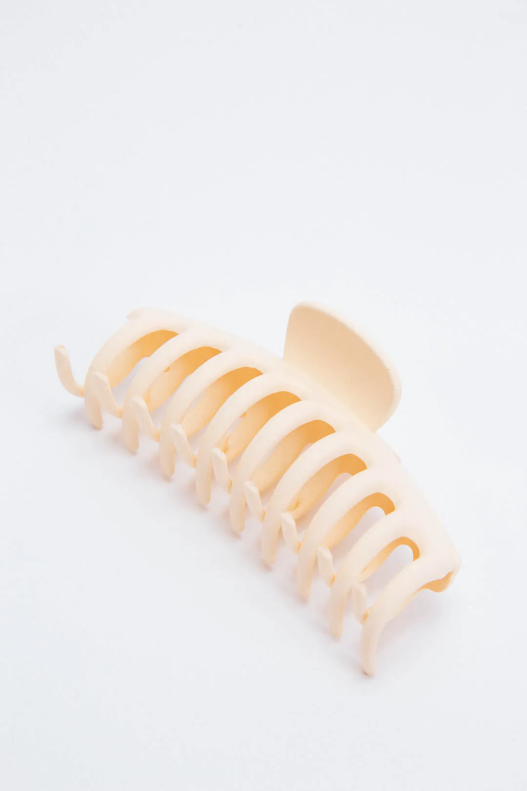 Oversized Claw Clip, Nude sold by North & Main Clothing Company