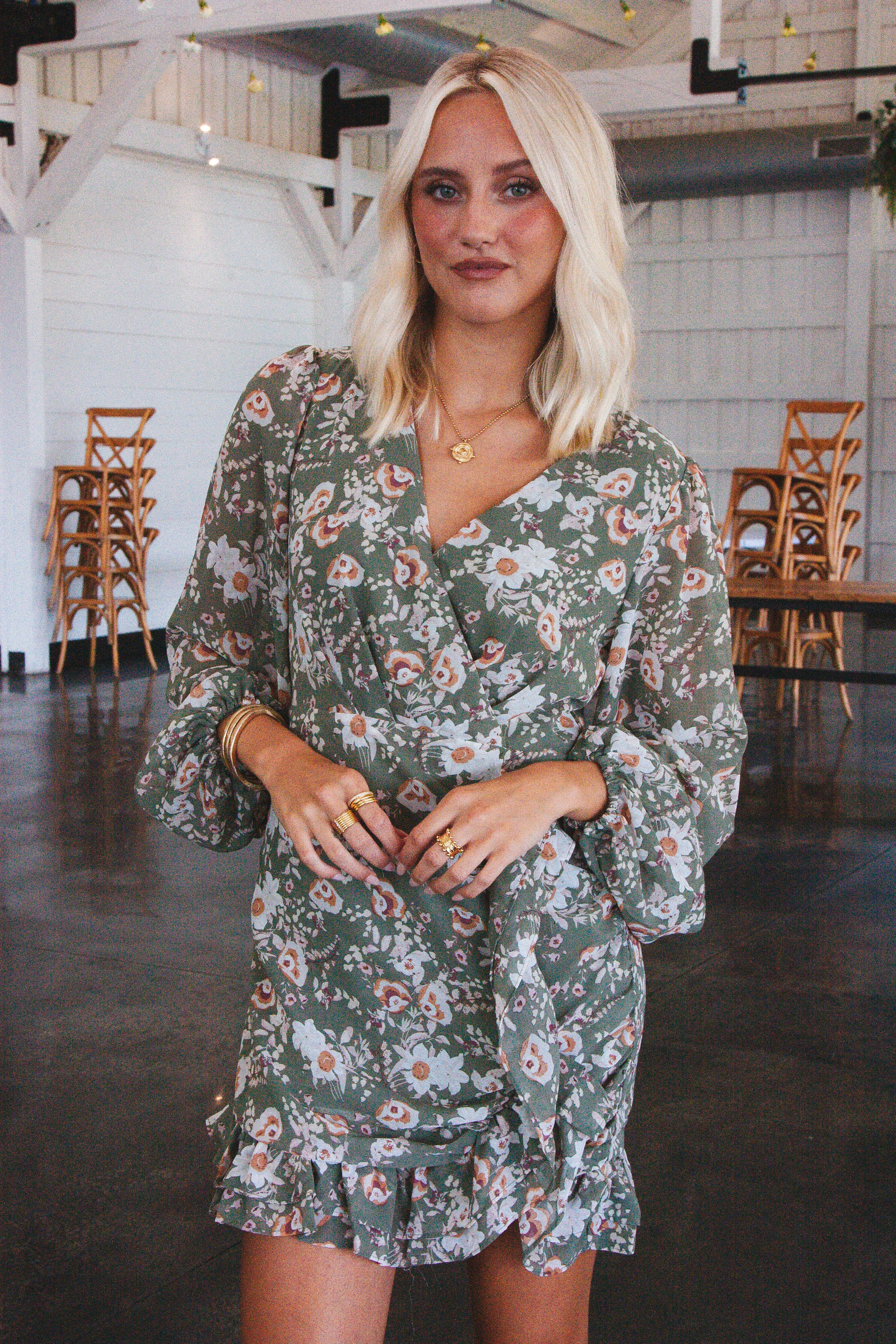 Feeling Flirty Floral Mini Dress, Olive sold by North & Main Clothing Company