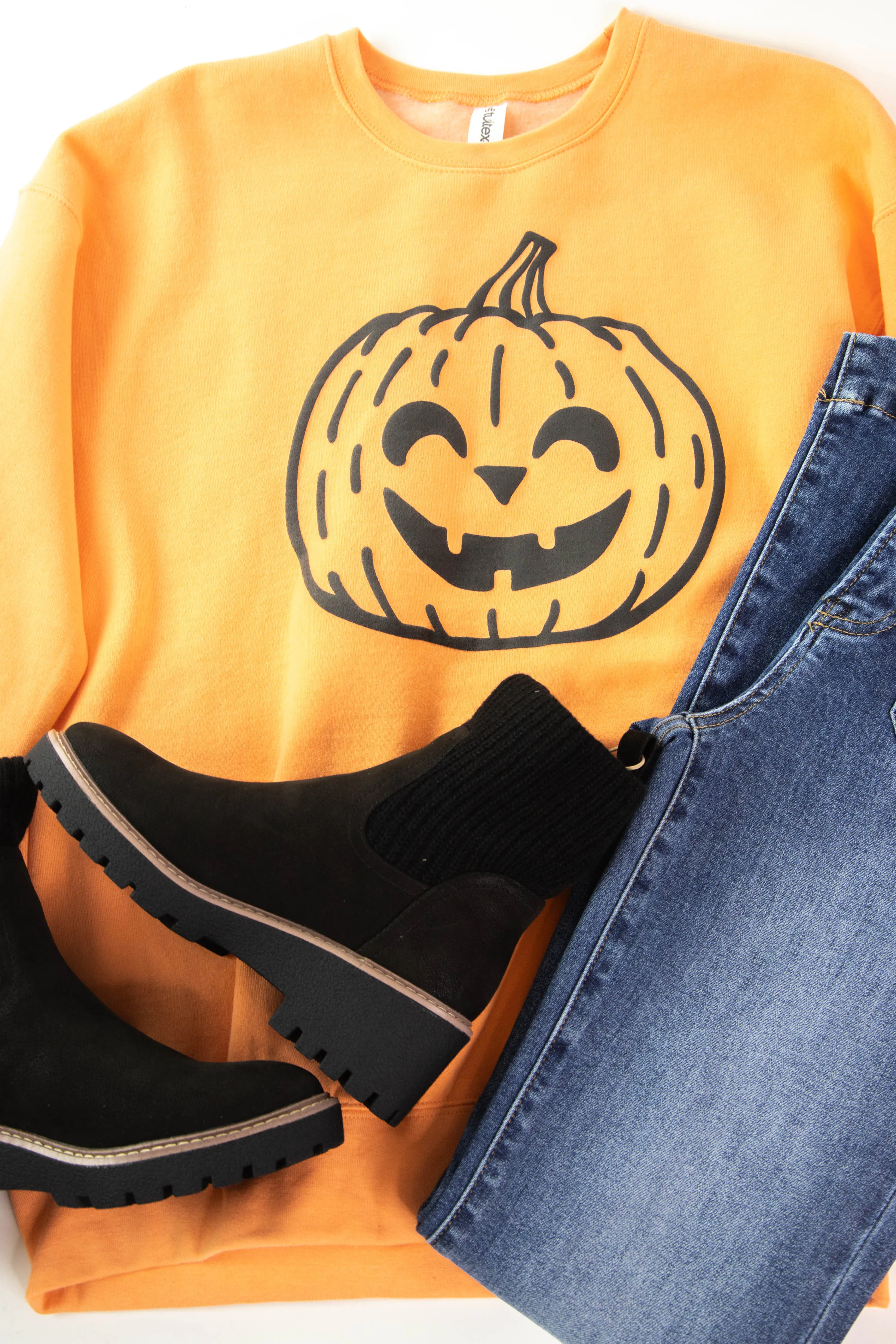 Spooky Jack O Lantern Sweatshirt, Light Orange sold by North & Main Clothing Company