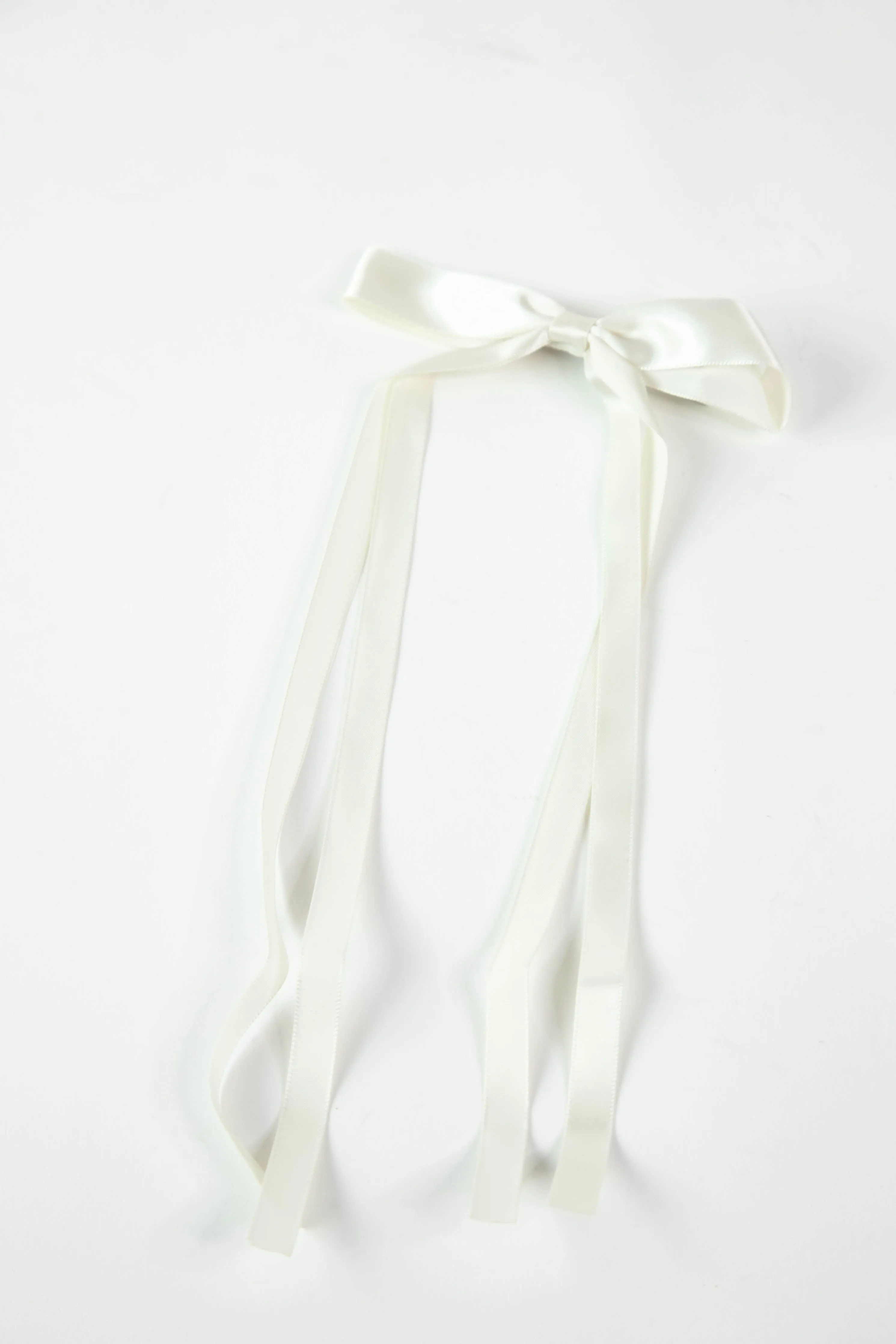 Vivi Long Bow Hair Clip, Off White sold by North & Main Clothing Company