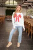 Christmas Bow Sweatshirt, White/Red sold by North & Main Clothing Company