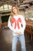 Christmas Bow Sweatshirt, White/Red sold by North & Main Clothing Company