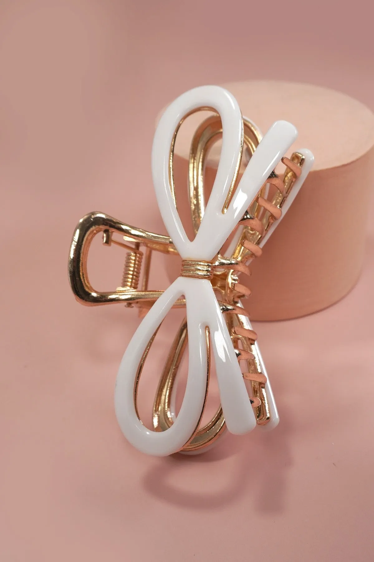 Large Metal Bow Ribbon Hair Claw, White sold by North & Main Clothing Company