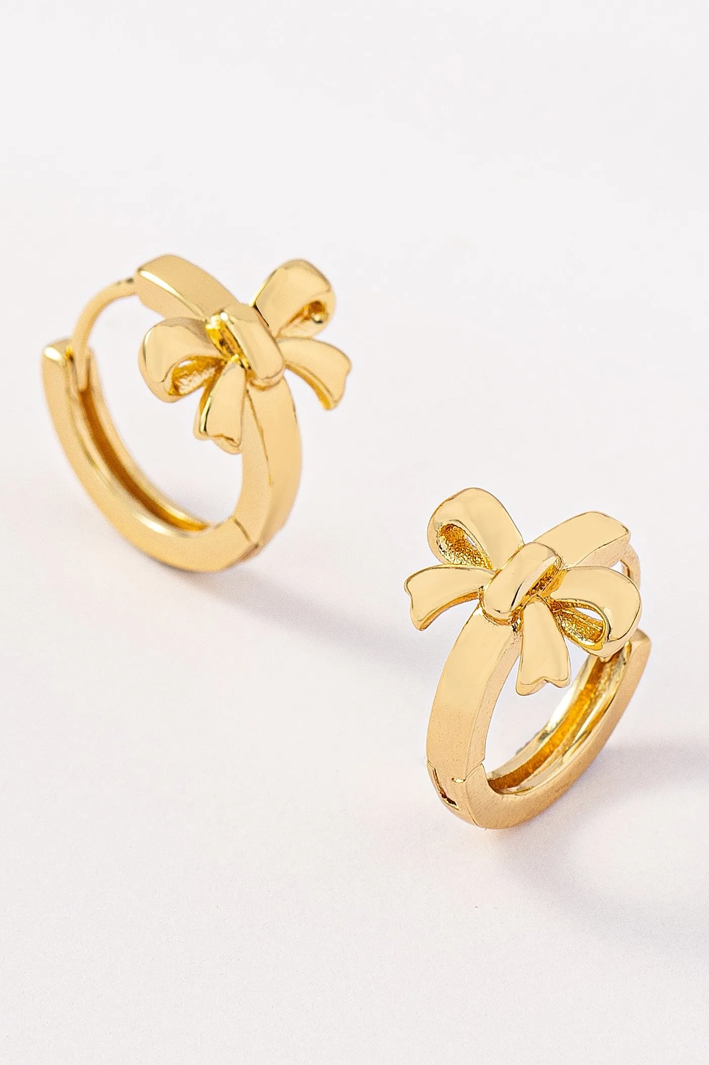 Charlotte Bow Huggie Hoop Earring, Gold sold by North & Main Clothing Company