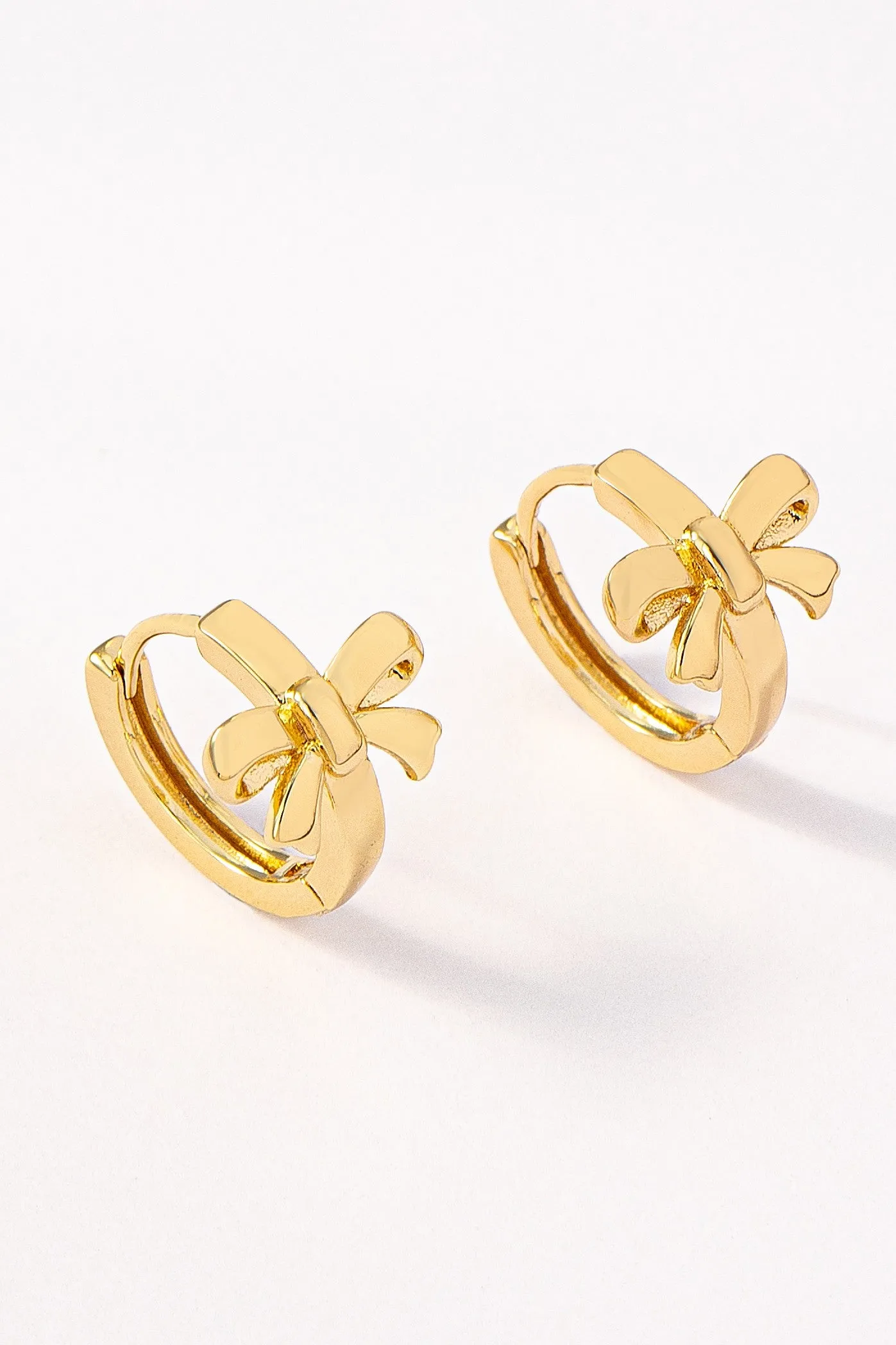 Charlotte Bow Huggie Hoop Earring, Gold sold by North & Main Clothing Company product image thumbnail 3