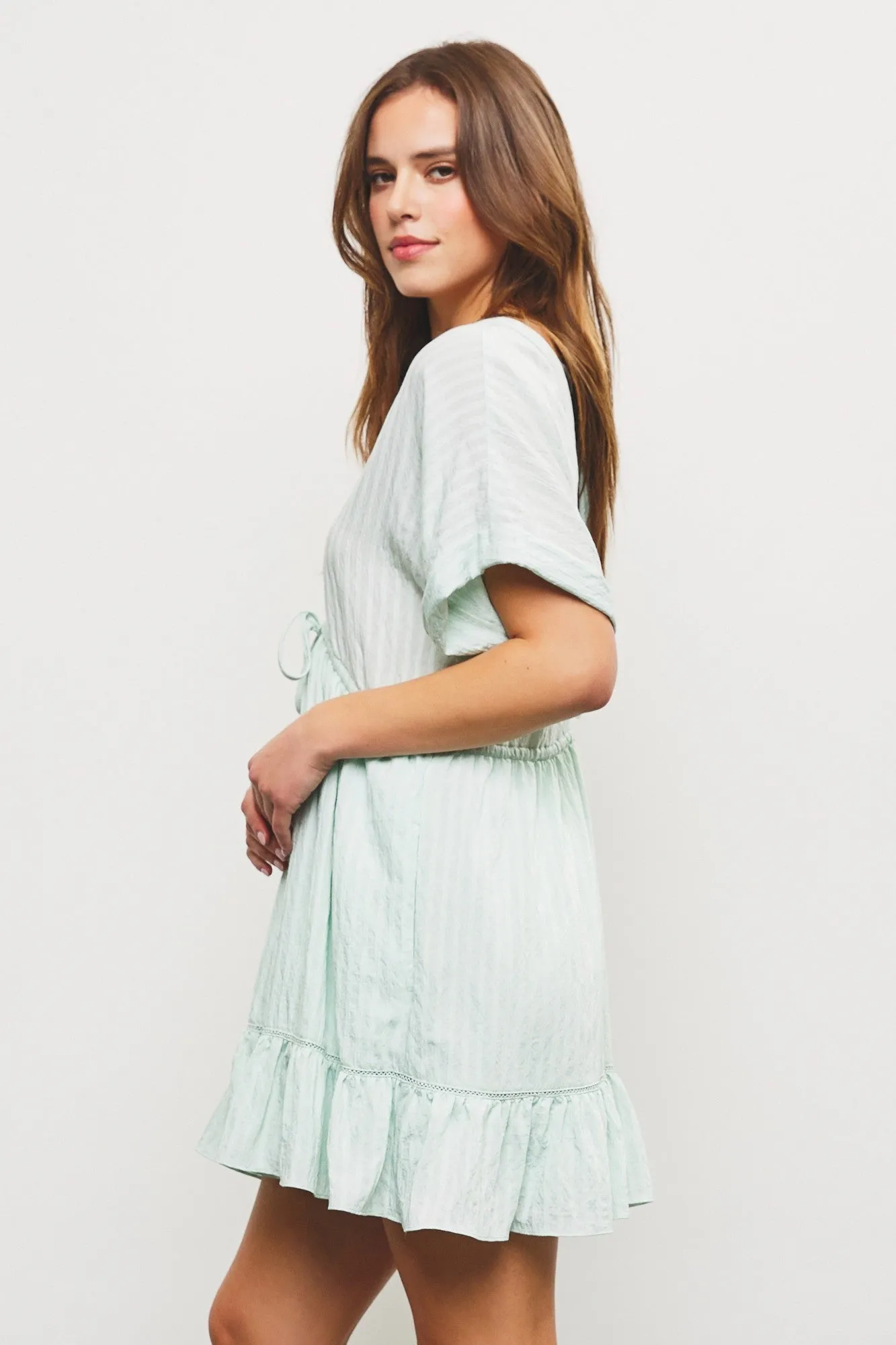 Aurora V-Neck Ruffle Hem Dress, Pistachio sold by North & Main Clothing Company product image thumbnail 4