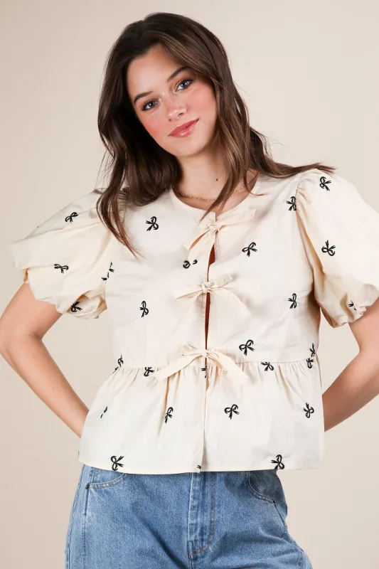 Clara Front Tie Bow Embroidered Top, Beige sold by North & Main Clothing Company