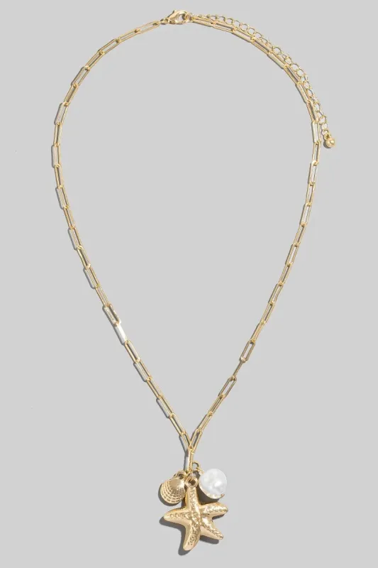Starfish, Clam & Pearl Charm Necklace, Gold sold by North & Main Clothing Company