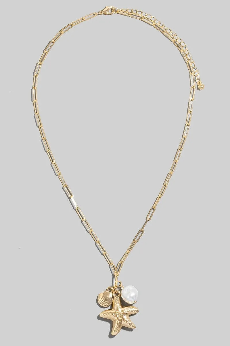 Starfish, Clam & Pearl Charm Necklace, Gold sold by North & Main Clothing Company