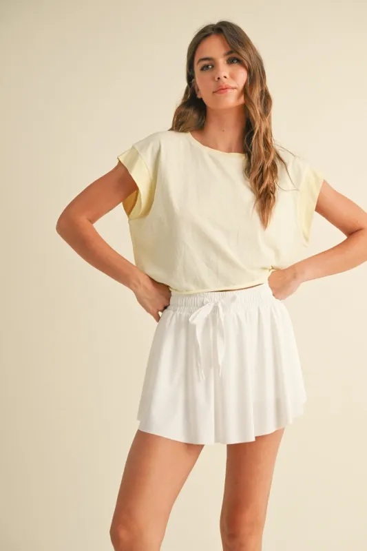 Jamie Cutout Back Raw Hem Tee, Lime made by North & Main Clothing Company