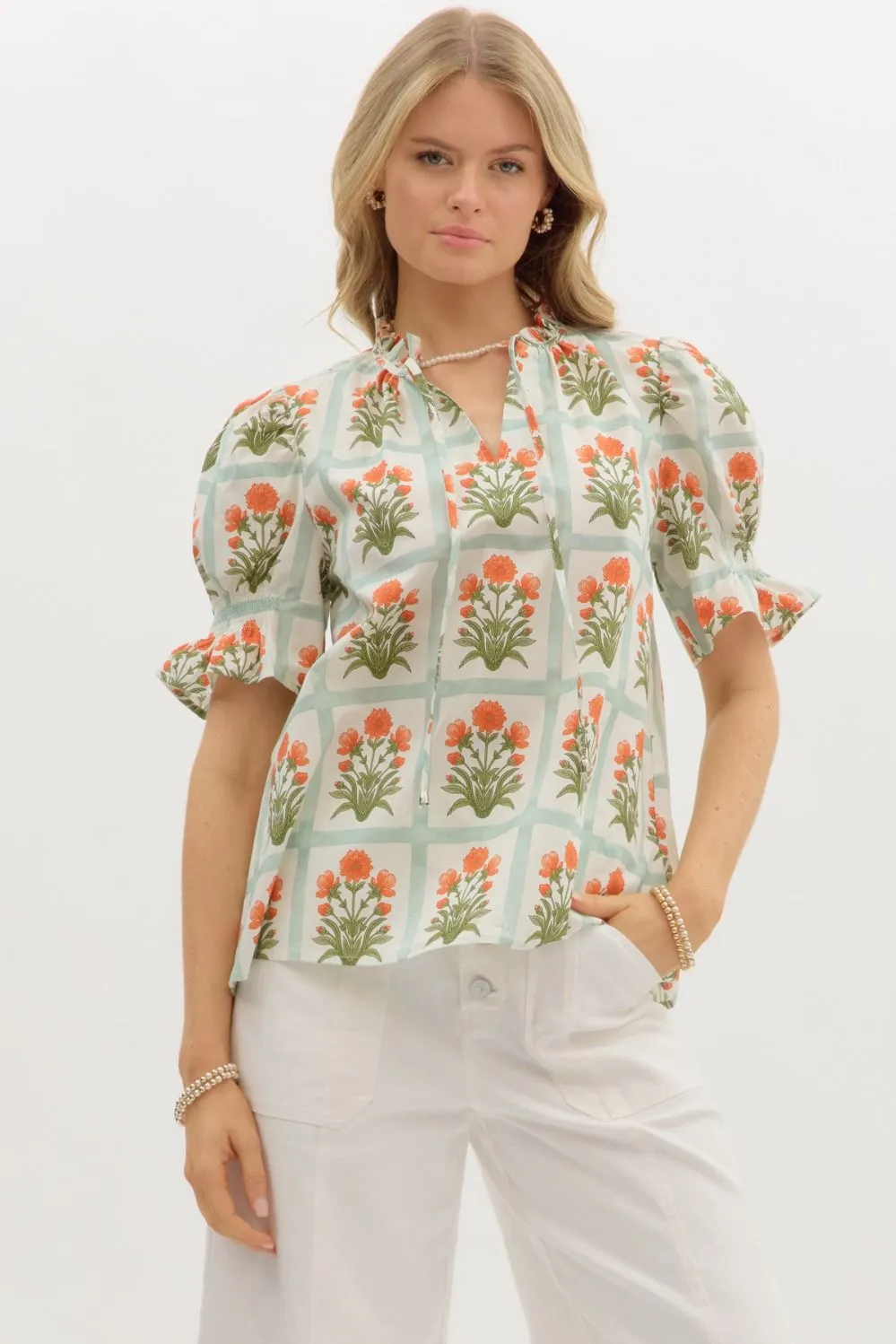 Liv Floral Ruffle Finish Top, Orange sold by North & Main Clothing Company