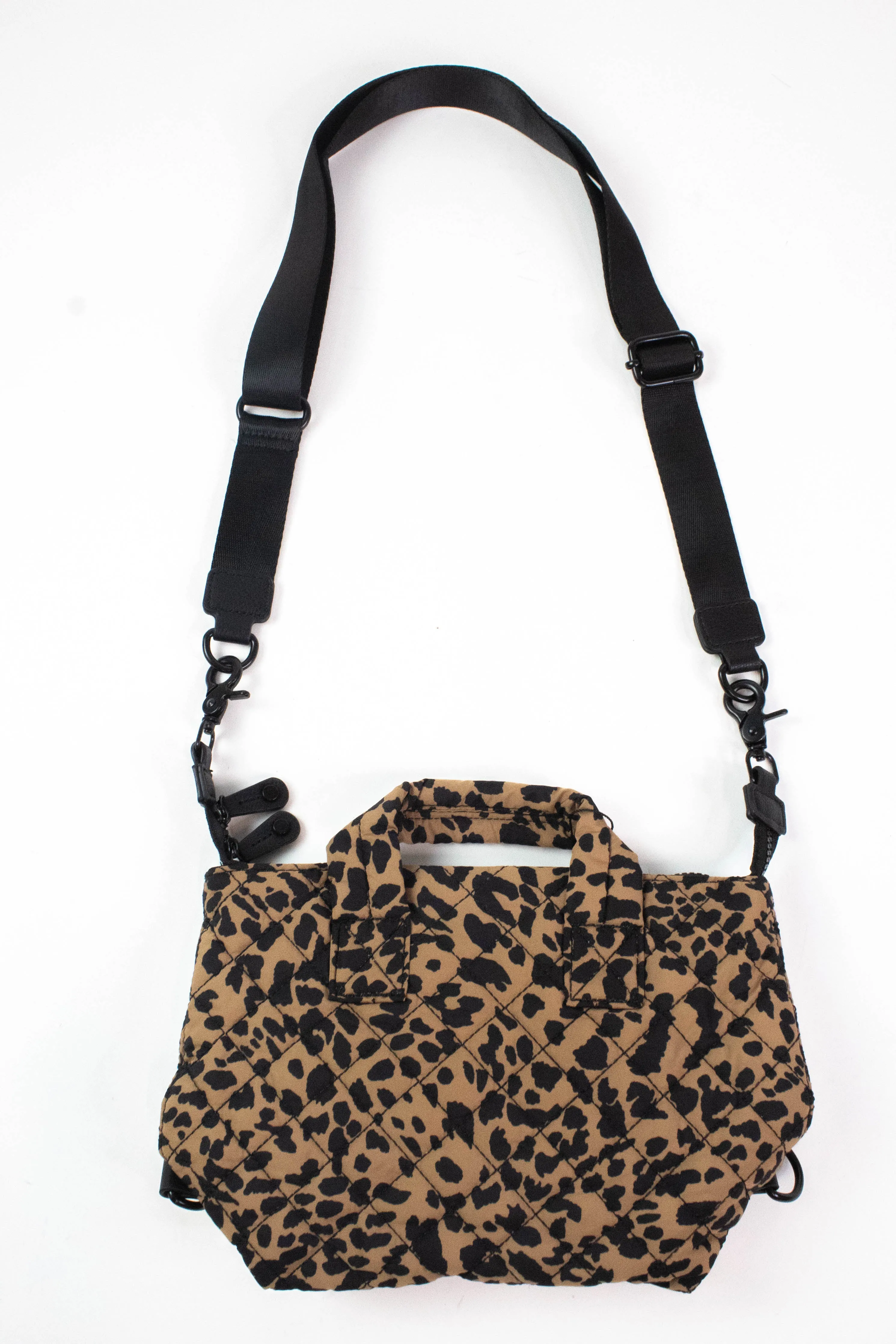 Melody Crossbody Quilted Mini Bag, Leopard sold by North & Main Clothing Company