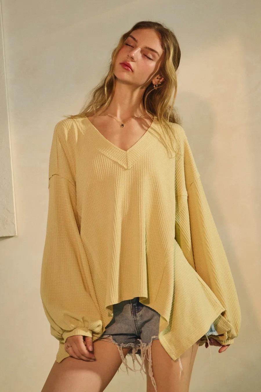 Savannah Textured Asymmetrical Hem Top, Buttermilk sold by North & Main Clothing Company