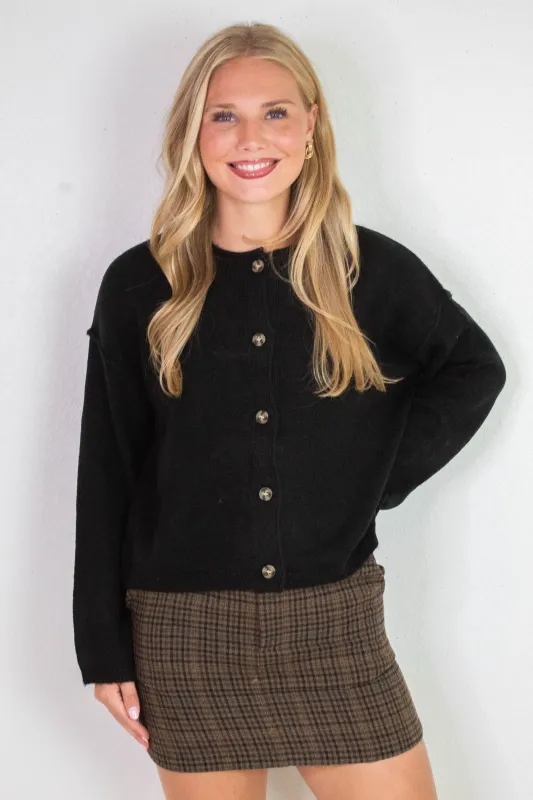 Melina Roll Neck Cardigan, Black sold by North & Main Clothing Company