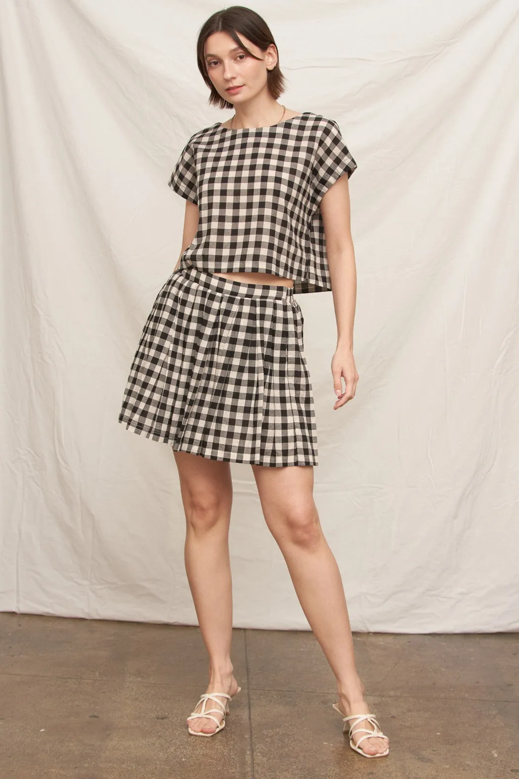 Jovie Pleated Skirt, Black Ivory sold by North & Main Clothing Company