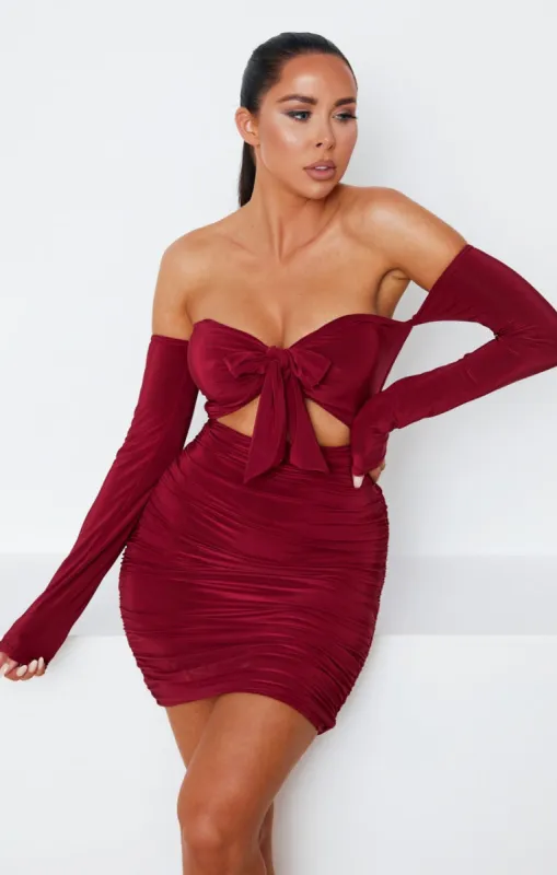Wine Slinky Ruched Bardot Long Sleeve Cut Out Tie Front  Bodycon Mini Dress - Zion sold by Femme Luxe