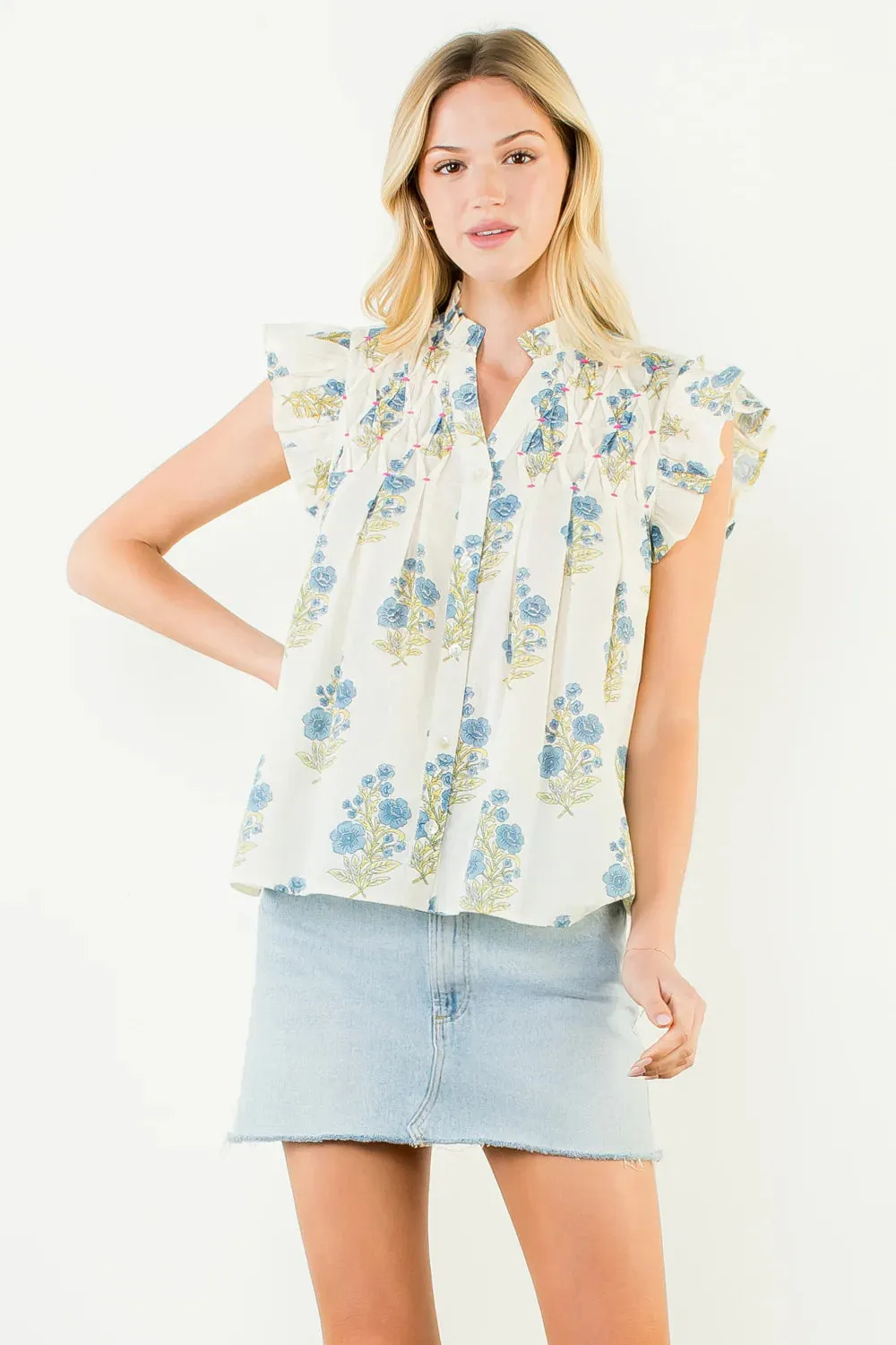 Renee Floral Flutter Sleeve Top sold by Madison Boutique