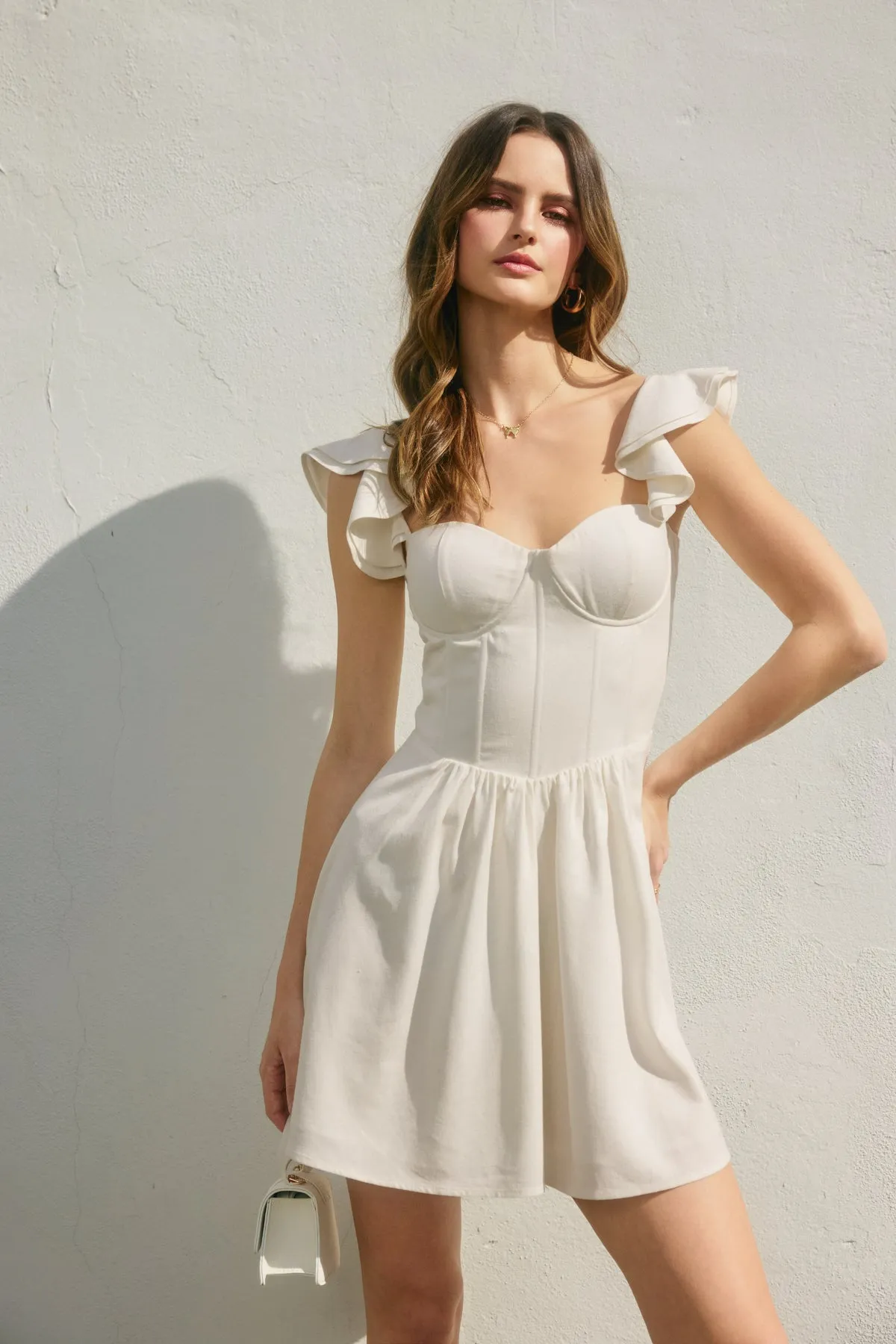 Molly Corseted Flutter Dress sold by Madison Boutique