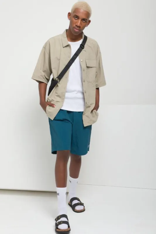 Textured Swim Shorts Teal sold by Ackermas