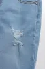 Ripped Denim Short Blue sold by Ackermas