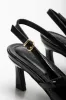 Slingback Heels Black sold by Ackermas