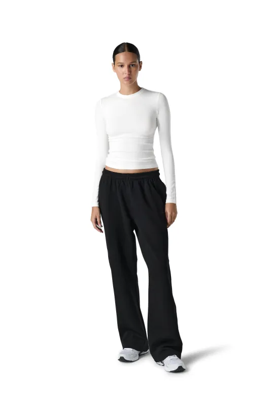 Peep Long Sleeve Top in White sold by Sisters and Seekers