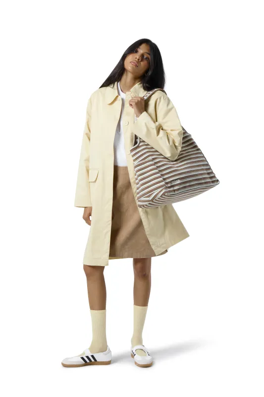 Canary Trench Coat in Butter Yellow sold by Sisters and Seekers