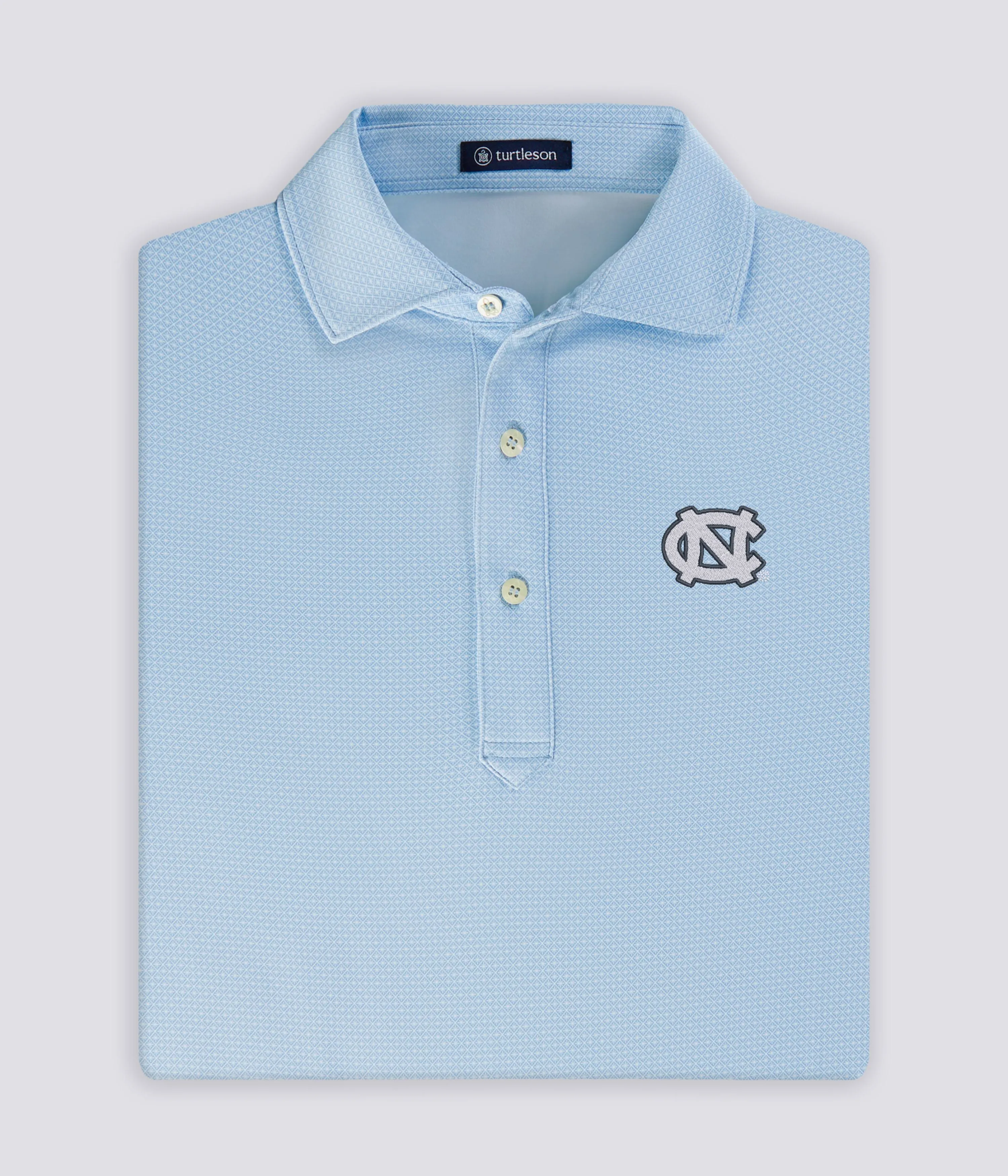 Chris Performance Polo - North Carolina Tar Heels sold by Turtleson