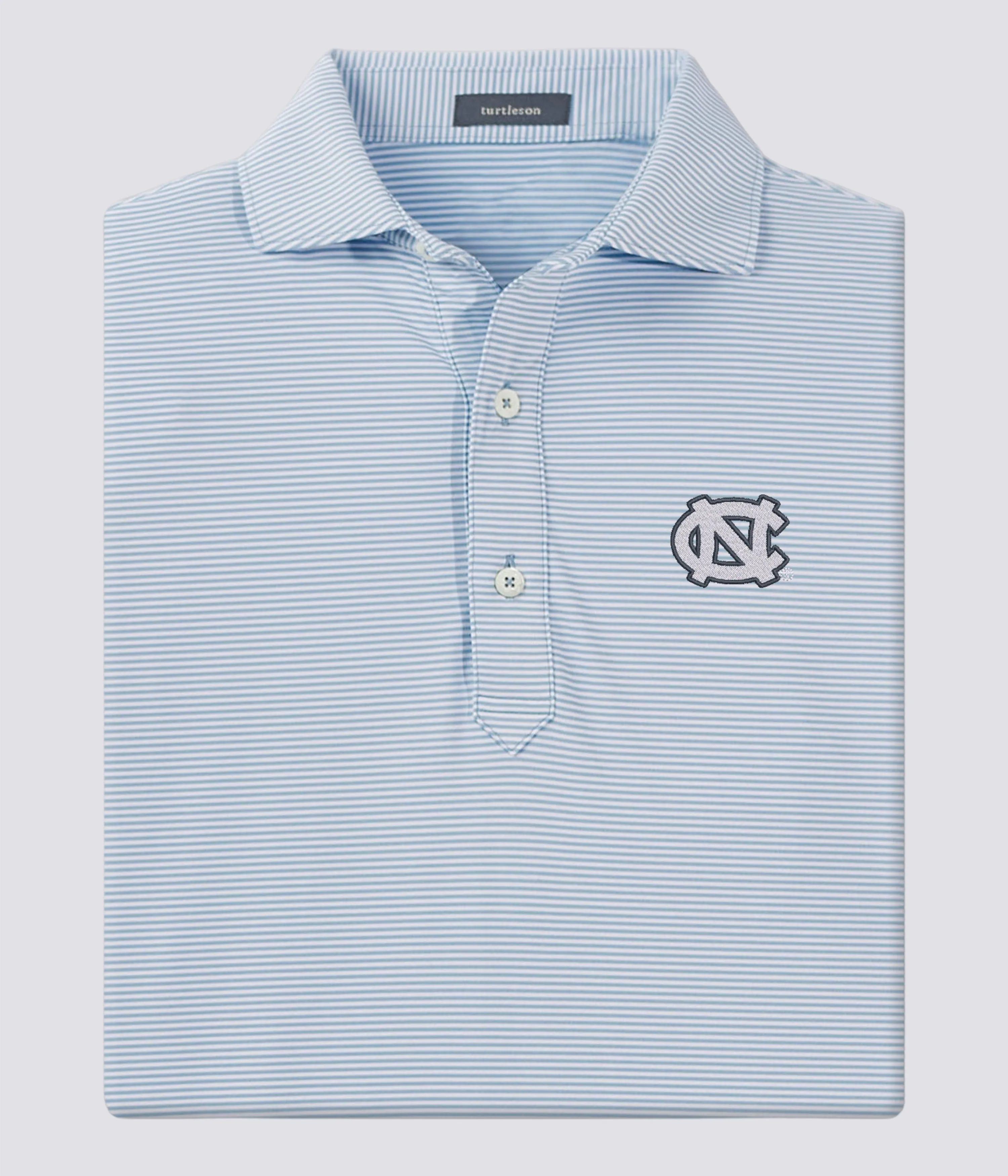 Carter Performance Polo - North Carolina Tar Heels sold by Turtleson