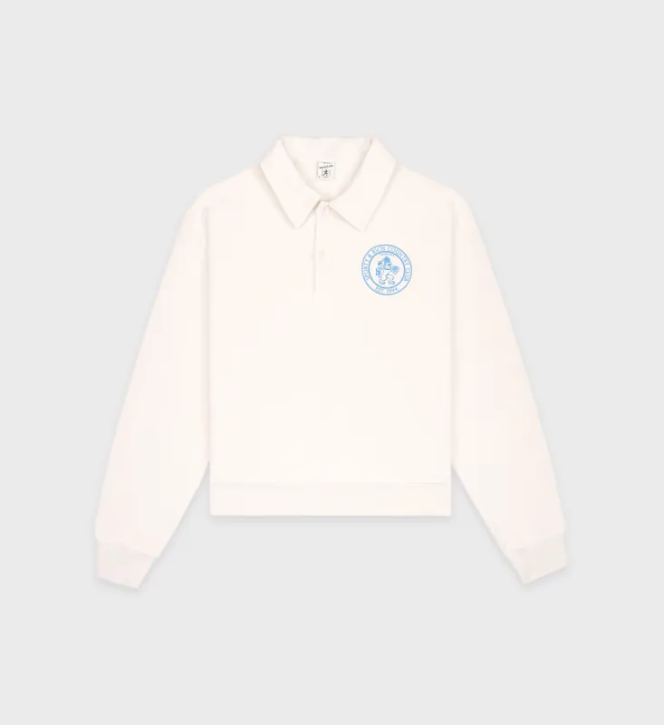 Lion Crest Polo - Cream/Steel Blue sold by Sporty and Rich