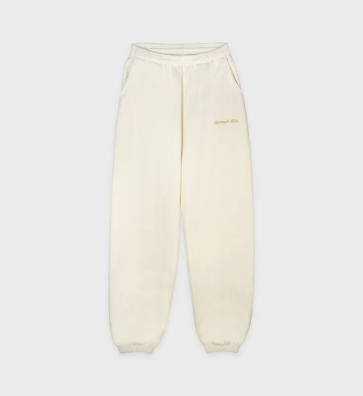 Classic Logo Sweatpant - Cream sold by Sporty and Rich