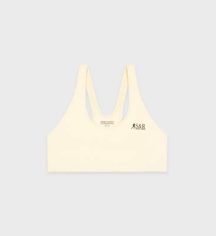 Action Logo Sports Bra - Faded Yellow/Black sold by Sporty and Rich