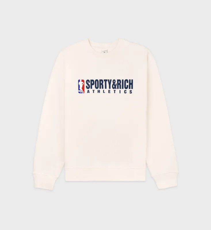 Team Logo Crewneck - Cream/Navy sold by Sporty and Rich