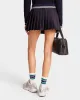 Abigail Wool Pleated Skirt - Navy/Off White sold by Sporty and Rich