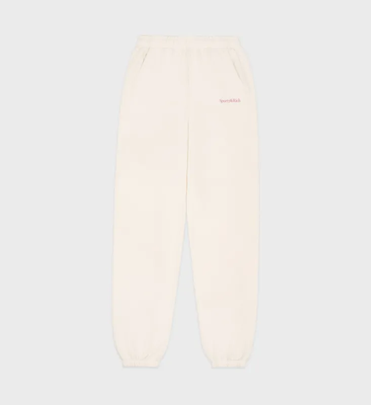 Serif Logo Sweatpant - Cream sold by Sporty and Rich