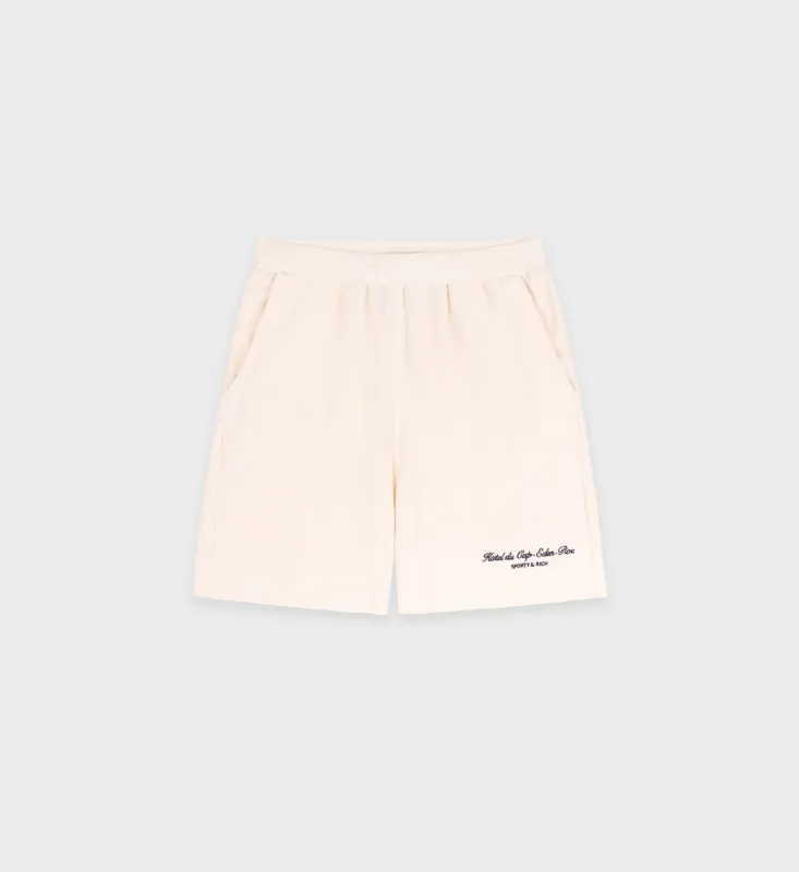 Hotel du Cap Cursive Terry Short - Cream/Navy sold by Sporty and Rich