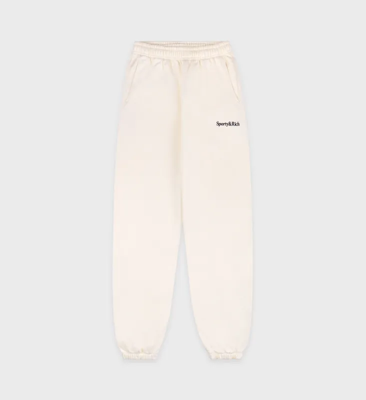 Serif Logo Sweatpant - Cream/Navy sold by Sporty and Rich