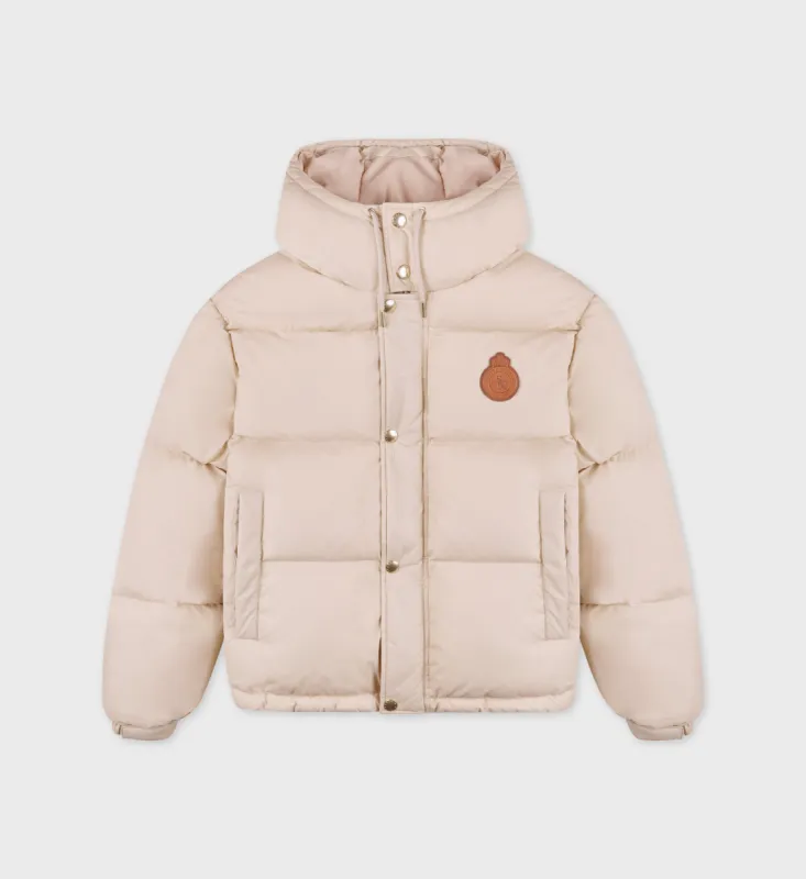 Crown Puffer Jacket - Cream sold by Sporty and Rich
