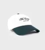 The Carlyle Souvenir Hat - White/Forest sold by Sporty and Rich