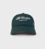 The Carlyle Souvenir Hat - Forest/White sold by Sporty and Rich